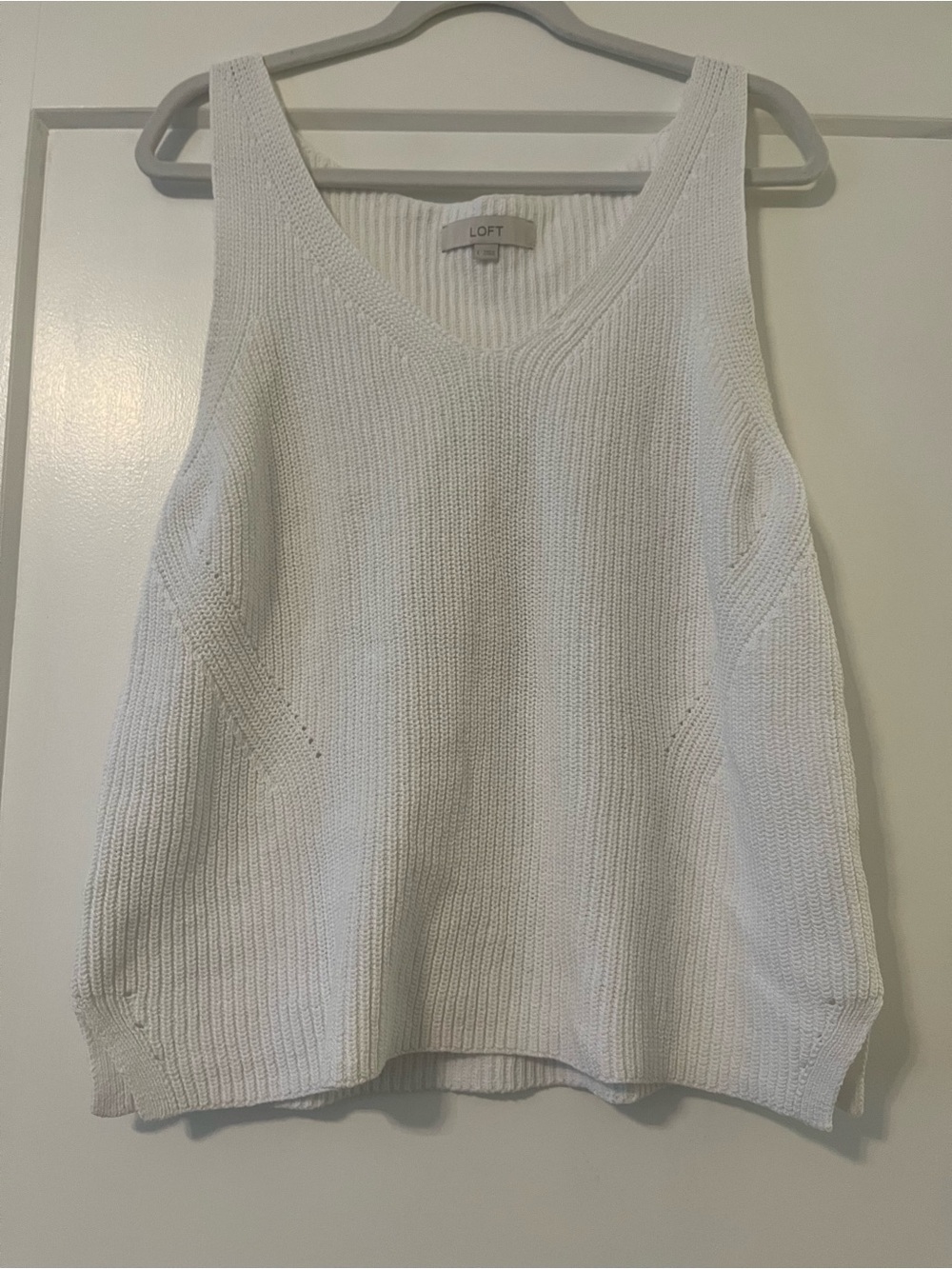 Sleeveless white top